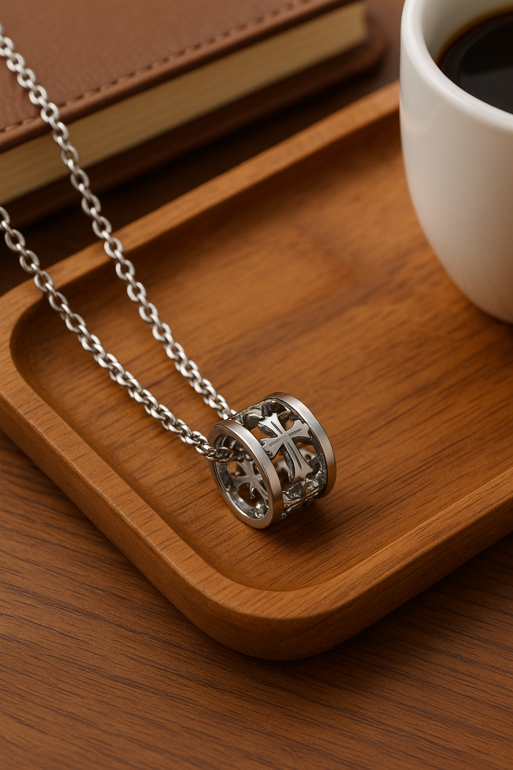 FLOs Eternal Axis – Rotating Cross Barrel Pendant