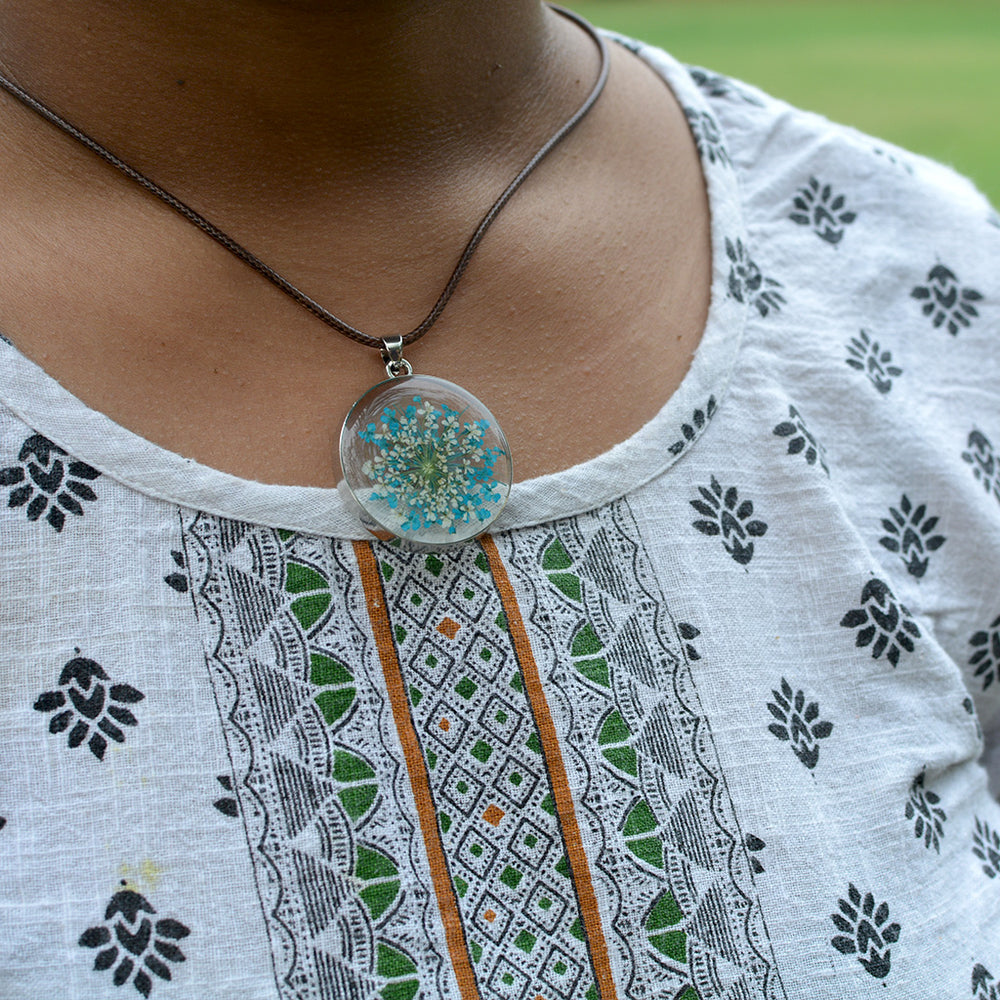 FLO's "Whispers of Bloom” Pendant - Nature’s delicate voice, captured in glass