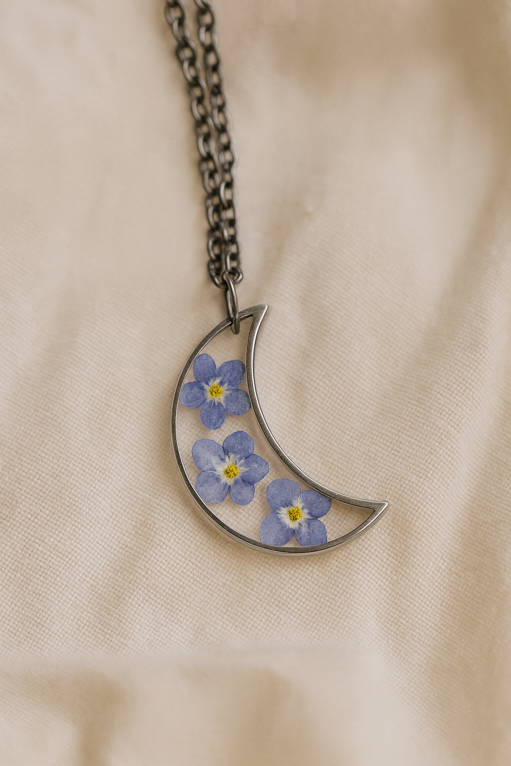 FLO's  Celestial Memory Moon Pendant – Forget-Me-Not Edition
