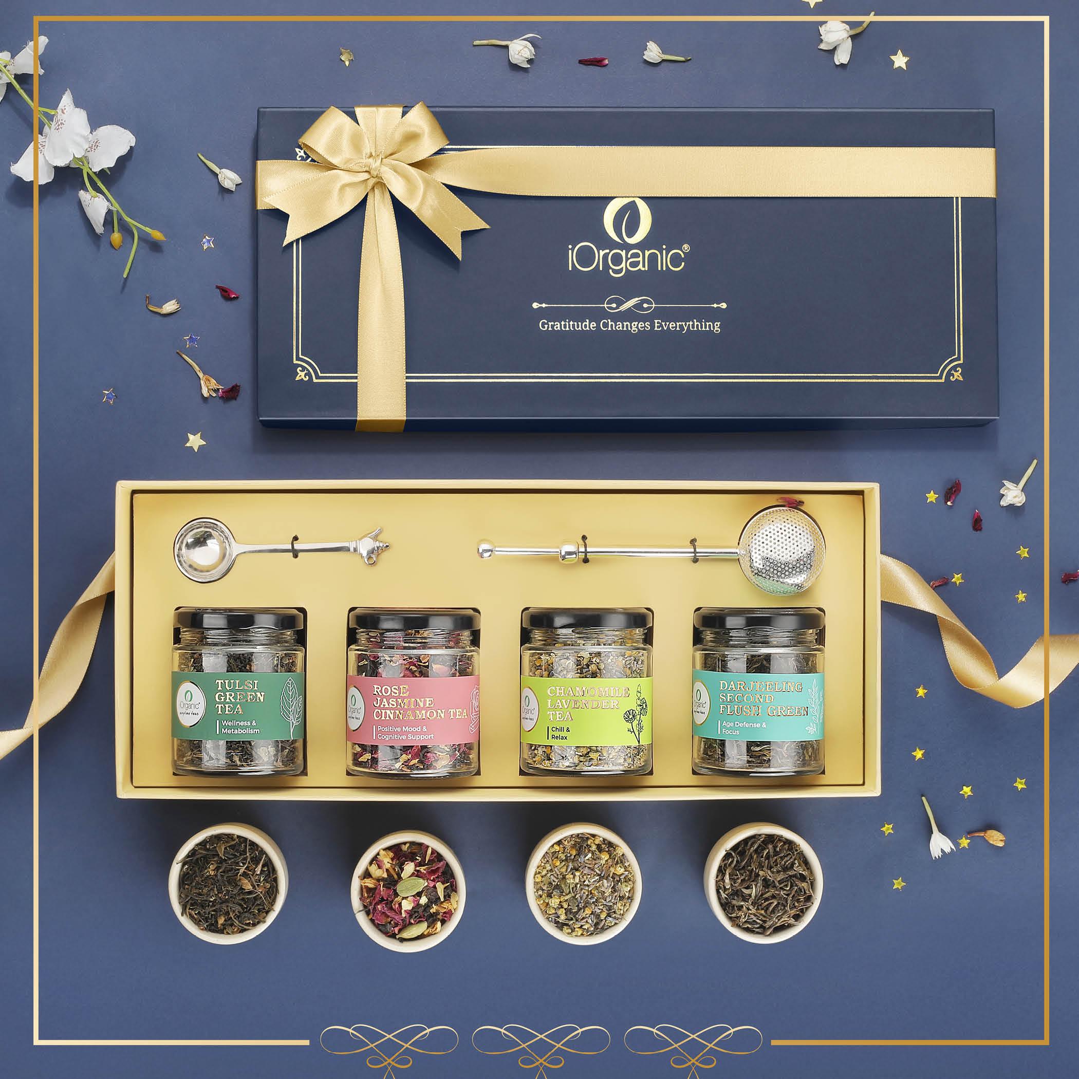 Serenity Royale Tea Collection box with 4 wellness teas, nickel tea spoon, brass strainer, and rigid gift box
